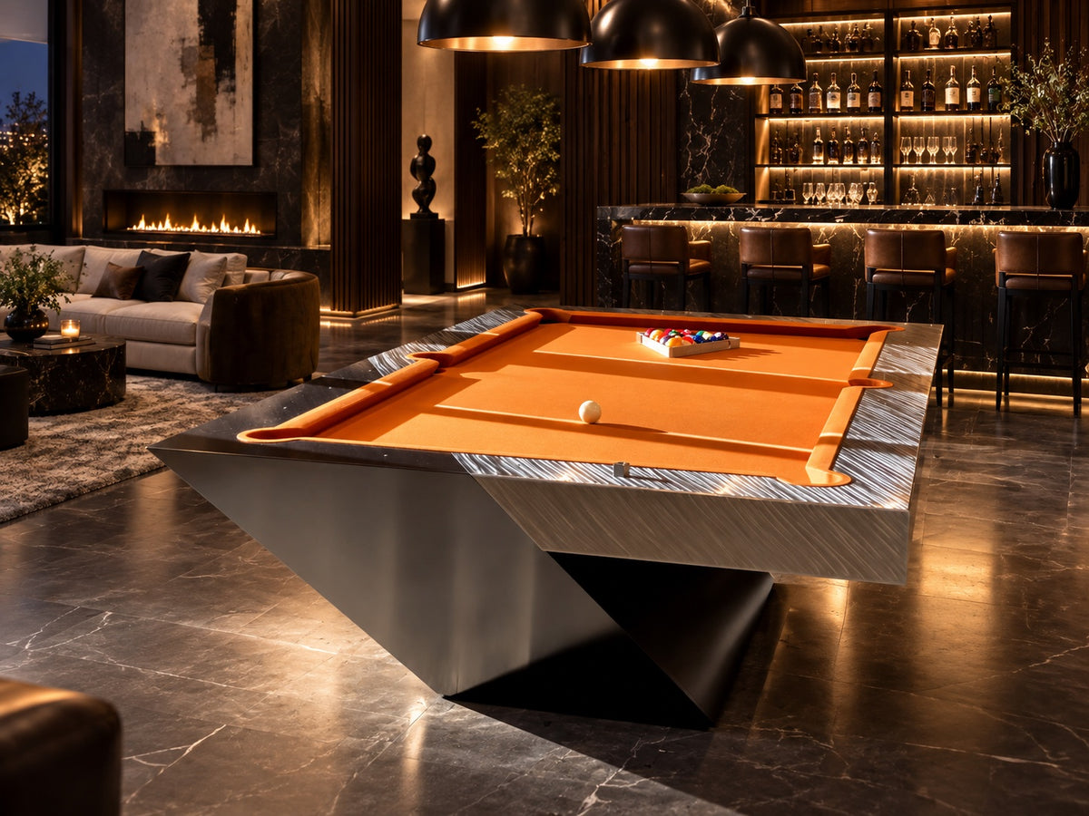 Steel and wood pool table with orange cloth in a dark luxury lounge bar at night