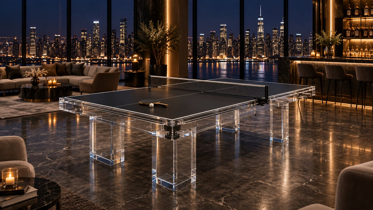 A designer table tennis table in an evening lounge overlooking a lit city skyline
